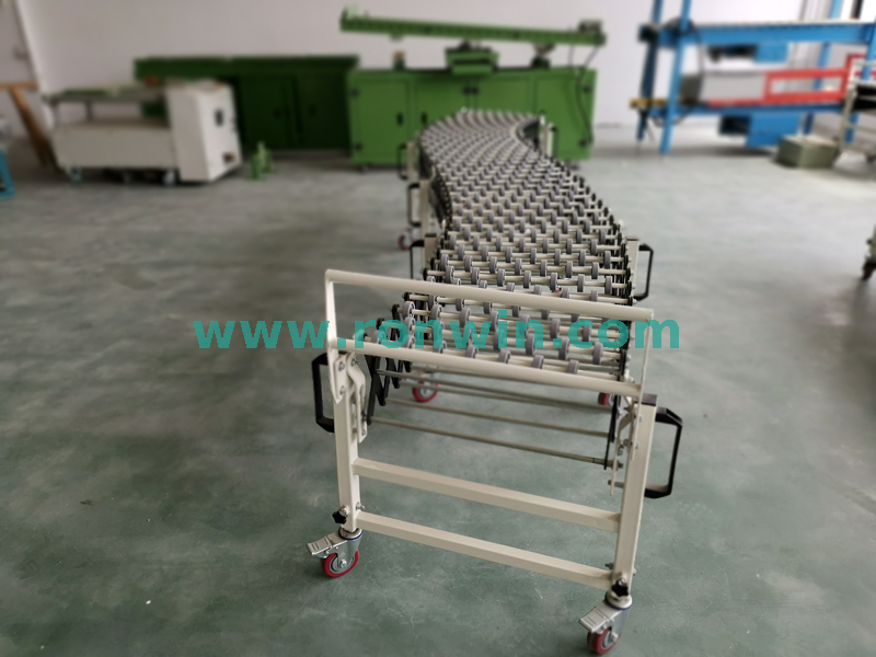 Transportador de rueda de patinaje extensible flexible para el manejo de materiales